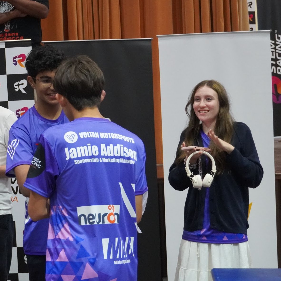Voltan team kit and sponsor branding during the event