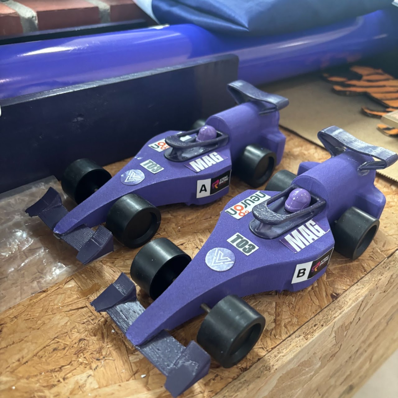 Two Voltan cars prepared ahead of racing sessions