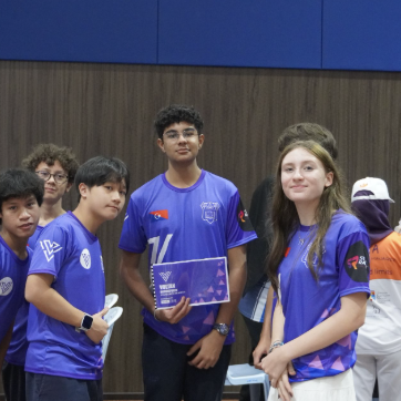 The team with its Voltan Motorsports presentation plaque
